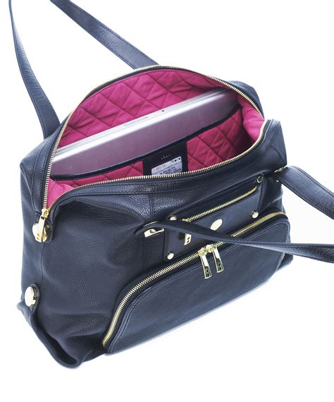 coach bag with laptop compartment.